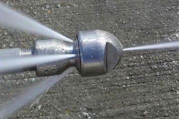 High pressure drain jetting nozzle and trigger handle